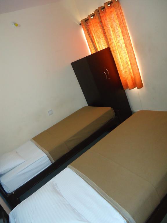 Sri Sai Comforts Hotel Bangalore Habitación foto